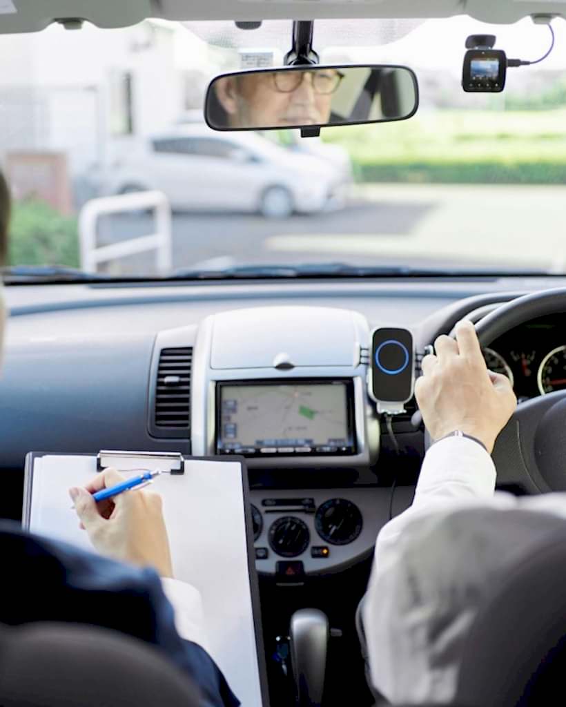 elderly-people-taking-training-in-driving-a-car-2023-11-27-05-02-47-utc